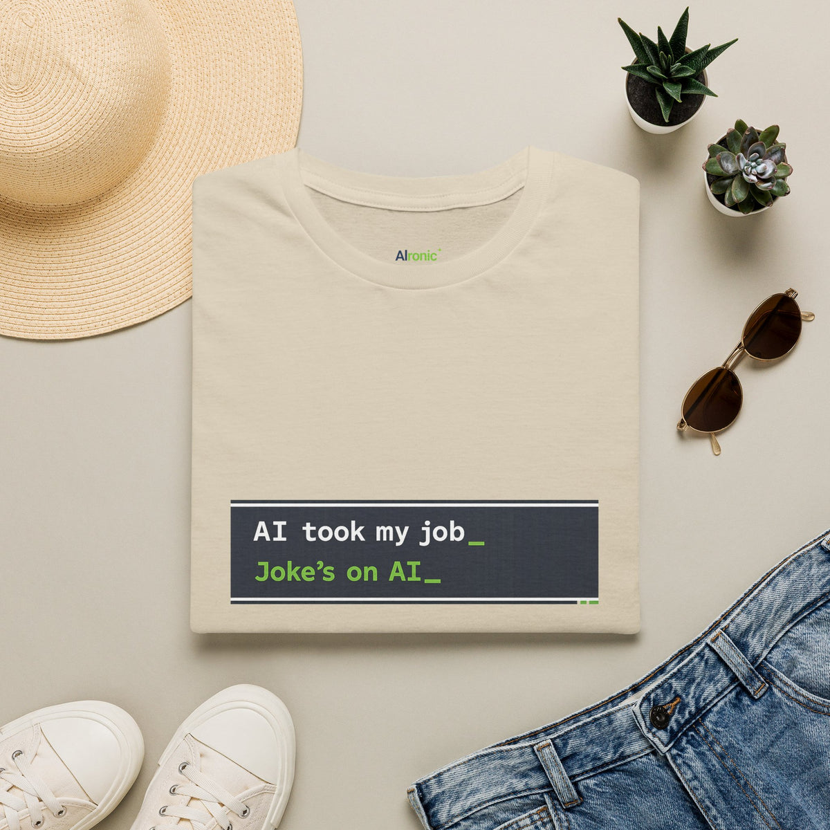 Sand T-Shirt featuring "AI Took My Job - Joke’s on AI" AI humor design by AIronic, gallery view 3