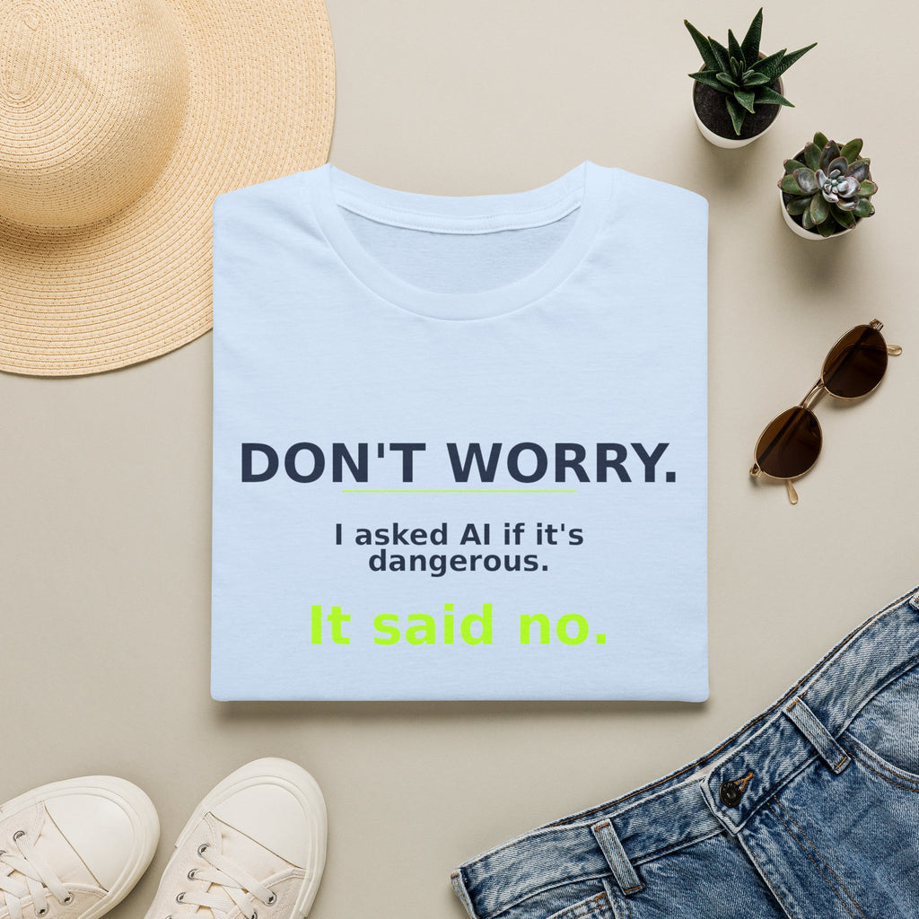 Folded Light Blue T-shirt showing "Don't worry. AI said no." AI humor design by AIronic