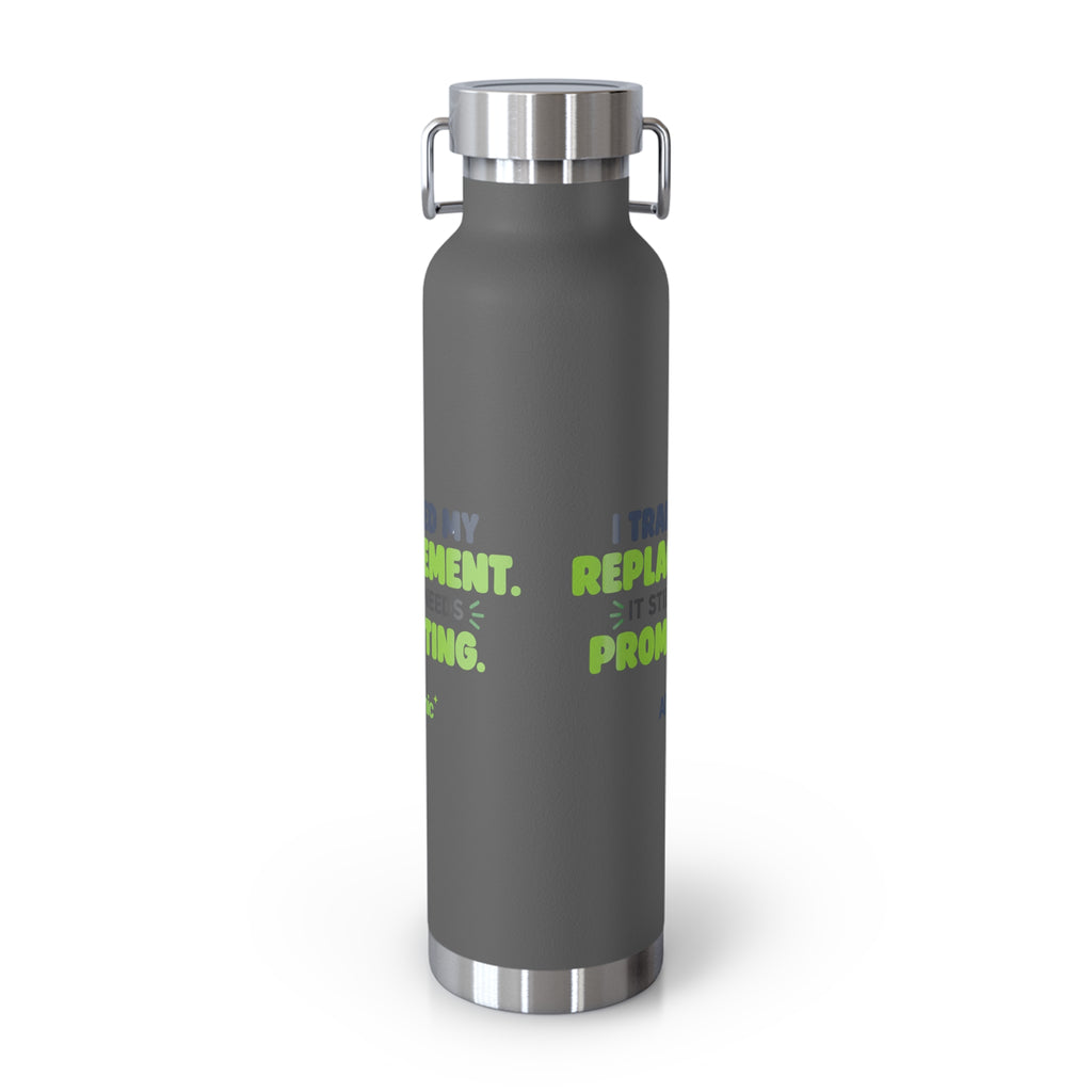 Grey 22oz water bottle featuring "I trained my replacement. It still needs prompting." AIronic design, back view