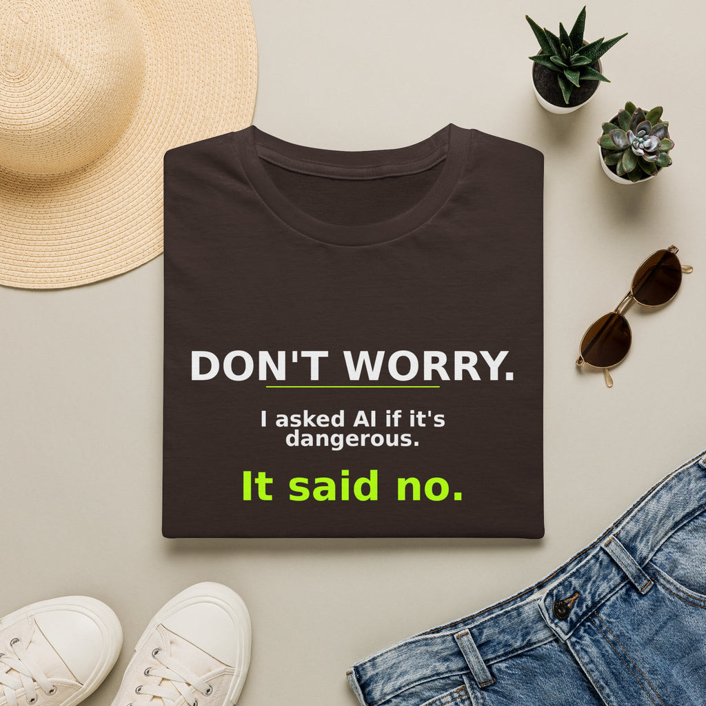 Folded Dark Chocolate T-shirt showing "Don't worry. AI said no." AI humor design by AIronic