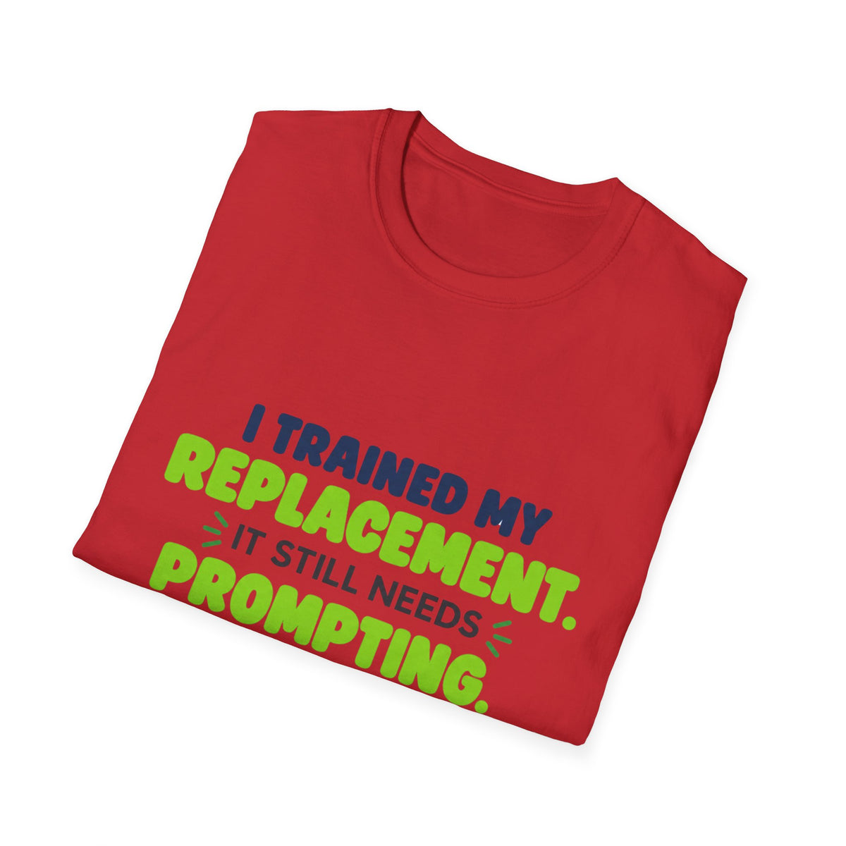 Red T-shirt featuring "I trained my replacement. It still needs prompting." AIronic design, folded detail view