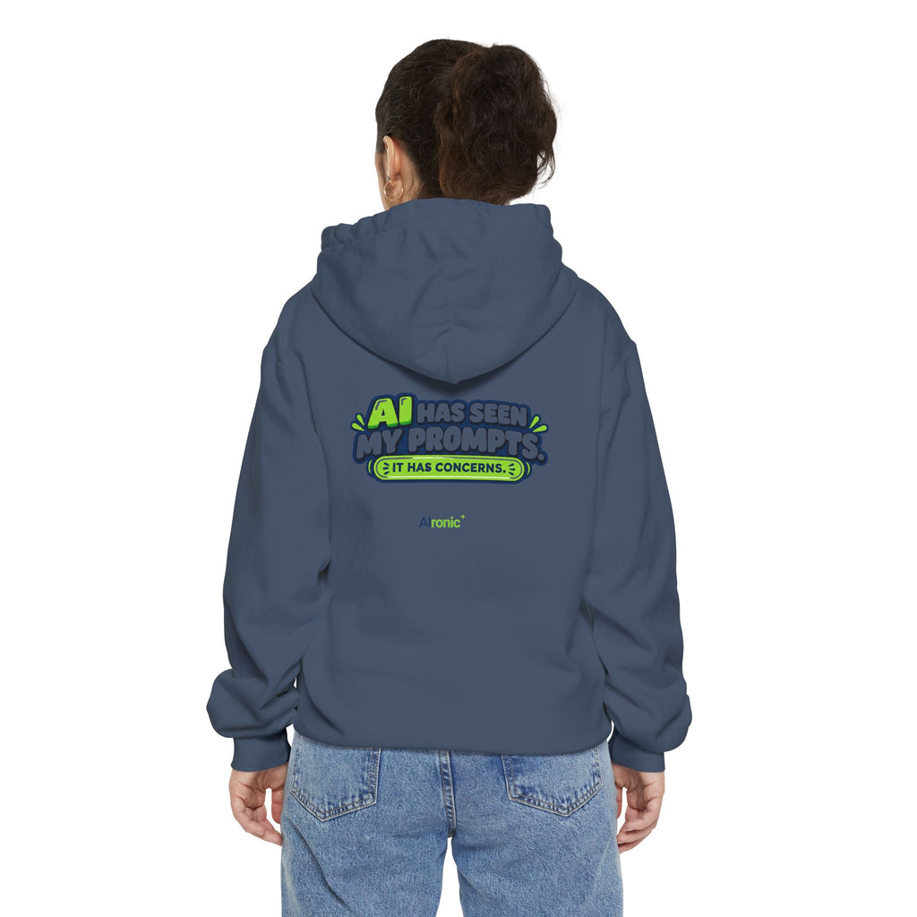 Crimson hoodie featuring “AI has seen my prompts. It has concerns” AI humor design by AIronic, catalog view 3
